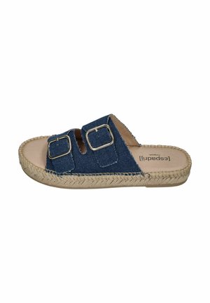 Blue denim slide sandal with two adjustable silver buckles and braided jute sole.