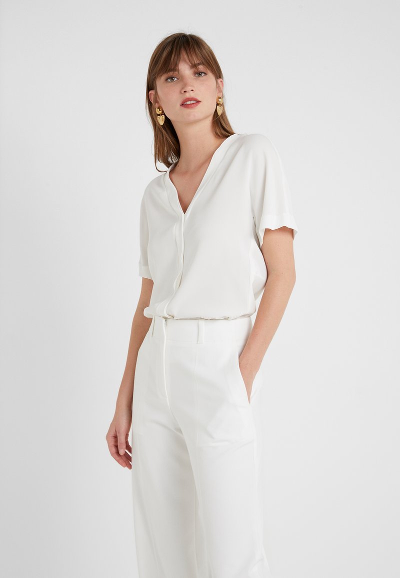 Marc Cain Essentials Women's Loose Fit Sleeveless Top In Off White +E 61.01 W41 Col 110