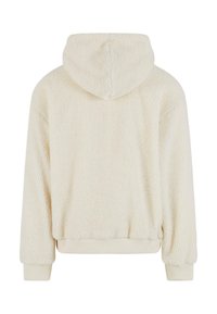 Cremefarbener Fleece-Hoodie mit strukturiertem Oberflächen, ausgestattet mit Kapuze, langen Ärmeln sowie elastischen Bündchen und Saum.
