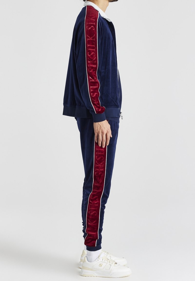 SIKSILK Training jacket dark blue (Pre-owned) Zalando