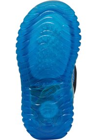 Semelle de chaussure en caoutchouc bleu translucide avec des rainures et des cercles texturés, mettant en avant un design de traction. Présente le logo de Geox et un logo circulaire.