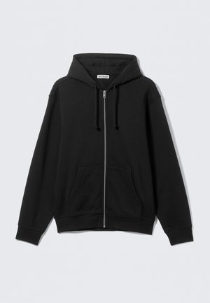 Black zip-up hoodie with front pockets, adjustable drawstring hood, and long sleeves, displayed against a light gray background.