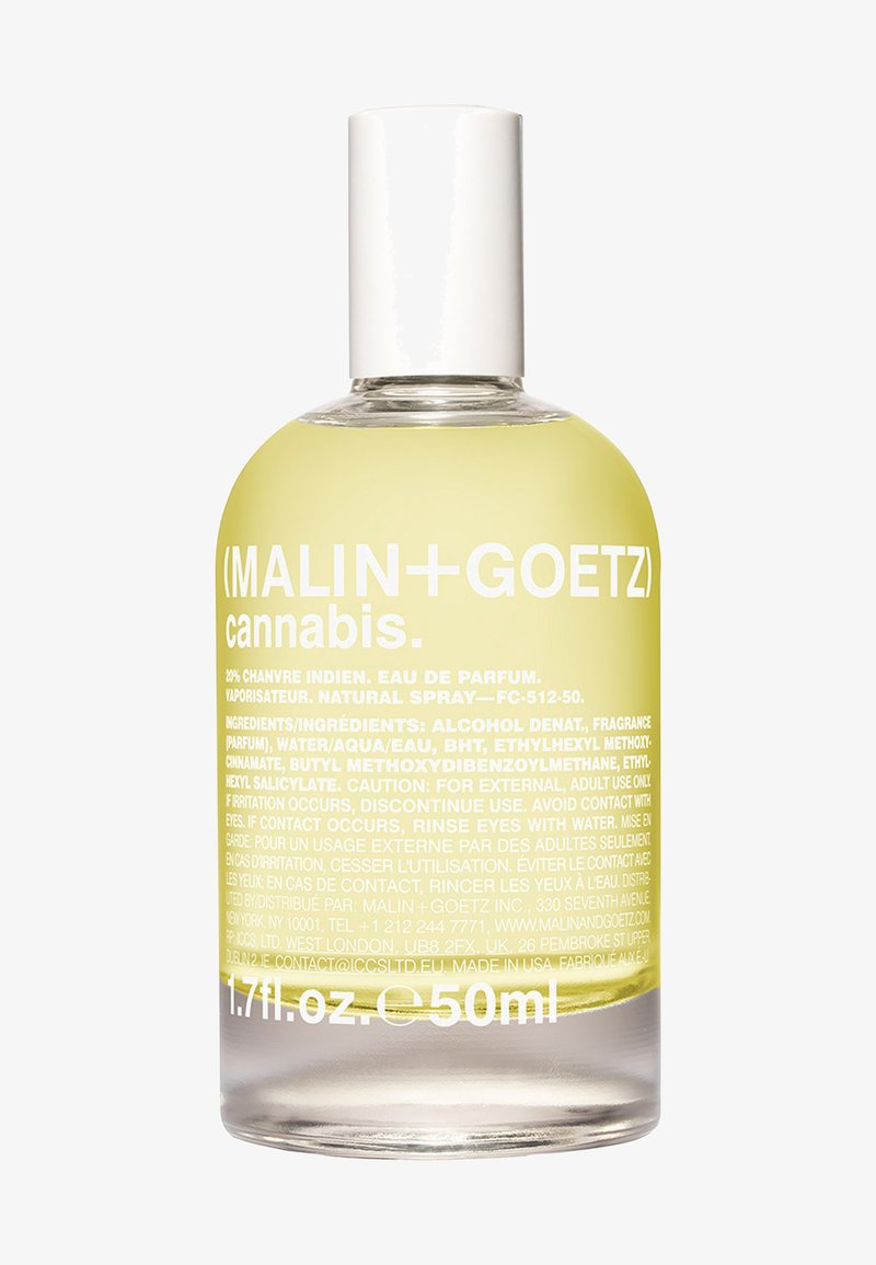 Klare Glasflasche mit 50 ml gelbem Duftspray, zylindrische Form, mit einem weißen Deckel. Die Etiketten haben weißen Text auf gelbem Hintergrund.