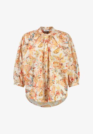 Cvjetna bluzica od lagane tkanine, sa uzorcima narančaste, žute i plave boje. Ima visoki izrez i napuhane rukave s elastičnim manžetama.