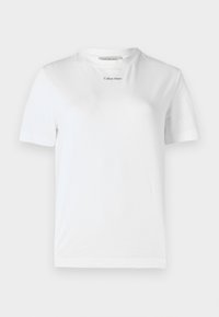 Valge puuvillane T-särk lühikeste varrukatega, ümar kaelus ja ees on väike must logo "Calvin Klein". Pehme tekstuur.