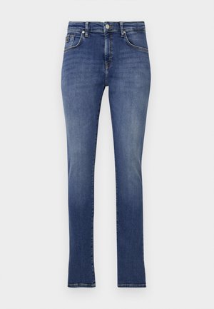 Dark blue denim jeans with a straight fit, mid-rise waist, front pockets, and subtle stitching accents. Smooth texture, minimal fading.