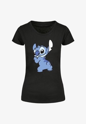 Sort t-shirt med en blå tegneseriefigur med store ører og udtryksfulde øjne, placeret legende med et smilende ansigt.
