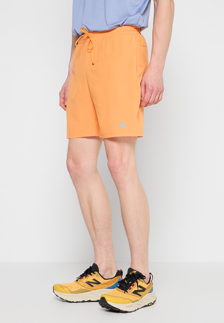 New Balance Korte broeken oranje New Balance Korte broeken oranje
