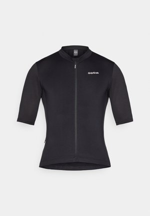 Melna īsā piedurkne velosipēdu krekls, kam ir priekšējais rāvējslēdzis, stāvoša apkakle un logo augšējā kreisajā pusē.