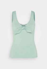 Top in maglia a coste verde menta con scollatura a barca e dettaglio a fiocco sul davanti. Design aderente con spalline larghe. Texture morbida.