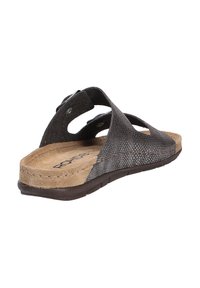 Brown leather slide sandal with perforated upper, cork footbed, and textured outsole. Features dual adjustable straps with circular hardware.