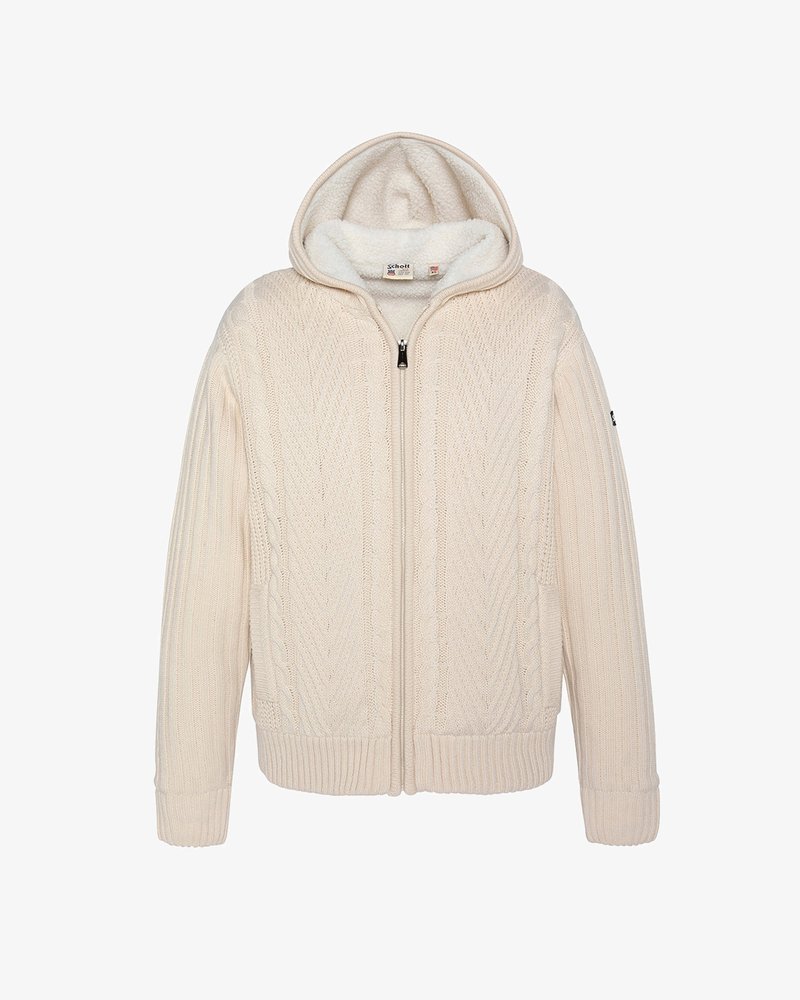 Hellbeige gestrickte Kapuzenjacke mit durchgehendem Reißverschluss, Zopfmuster, weichem Fleecefutter sowie gerippten Bündchen und Saum. Verfügt über eine abgerundete Kapuze.