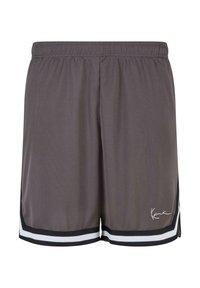 Grå atletiska shorts med en strukturerad tyg, elastisk midja och sidostrecker i svart och vitt. Har en tryckt logotyp på nederkanten.