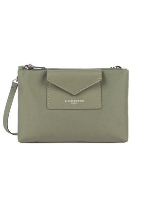 Olive green rectangular wristlet clutch with front envelope pocket and silver zipper, featuring "Lancaster Paris" logo in white.