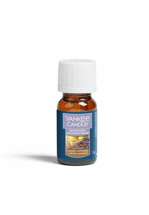 Klein amberkleurig glazen flesje van Yankee Candle Lemon Lavender diffuserblend met witte dop en blauw etiket met citroenen en lavendel.