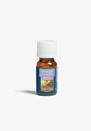 Klein amberkleurig glazen flesje van Yankee Candle Lemon Lavender diffuserblend met witte dop en blauw etiket met citroenen en lavendel.