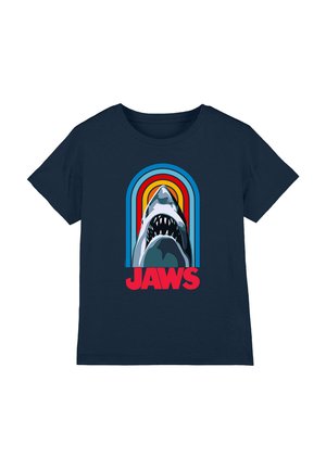 Navy blue cotton t-shirt featuring a graphic of a shark with open jaws, framed by colorful concentric arches; bold red text reads "JAWS."
