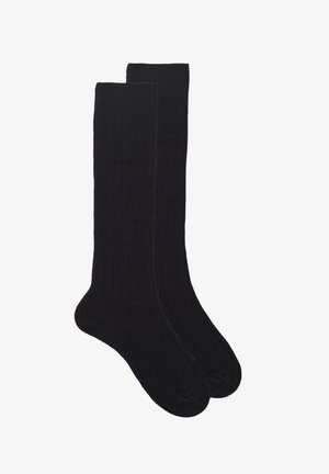 Calze nere al ginocchio con una trama a coste, dotate di punte rinforzate e una finitura liscia. Design semplice senza motivi o accenti.