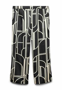 Pantalones de patrón negro y crema, hechos de una tela suave, con un diseño geométrico de líneas audaces y piernas anchas.