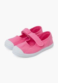 Pink canvas Mary Jane shoes with a white rubber toe cap and strap closure. Soft fabric and simple design, suitable for casual wear.