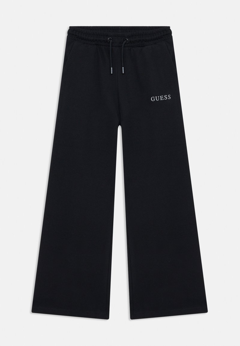 Čierne tepláky z mäkkej látky, s širokým strihom, elastickým pásom s šnúrkou a vyšívaným bielym logom "GUESS".