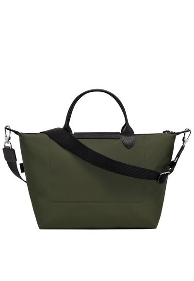 Olive green nylon tote bag with black leather accents. Features dual handles, adjustable shoulder strap, and a flat design with a front pocket.