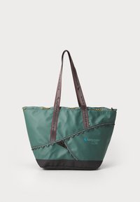 Tote-Bag aus grünem Nylon mit schwarzen Akzenten, ausgestattet mit doppelten Griffen, dekorativem gewelltem Besatz und Logodetail an der Seite.