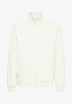 Chaqueta casual blanca con cierre de cremallera, cuello alto, puños y dobladillo elásticos. Cuenta con bolsillos laterales y un acabado suave y mate.