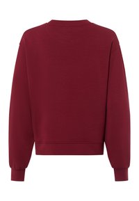 Bordeaux sweatshirt met een ronde hals, lange mouwen en aansluitende manchetten. Soepele textuur zonder zichtbare patronen of versieringen.