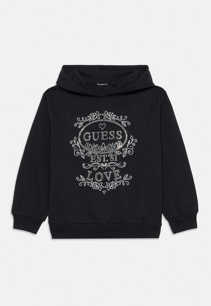 Svart hettegenser med snøring, med sølvfarget blomstertrykk som sier "GUESS EST. 81 LOVE" på forsiden. Mykt materiale.