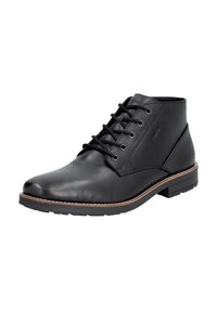 Bottines en cuir noir avec une texture lisse, bout rond et design à lacets. Présentent des coutures subtiles et une semelle brune contrastante.