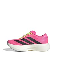 Pink athletic shoe with black side stripes, vibrant yellow laces, rounded toe, and a thick white sole for enhanced cushioning.