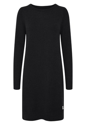 Vestido de punto negro con mangas largas, escote redondo y un corte relajado. Presenta una pequeña etiqueta con el logo en la parte inferior izquierda. Textura suave.
