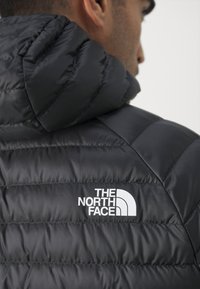 The North Face BETTAFORCA HOODIE - Jakna ispunjena paperjem - black