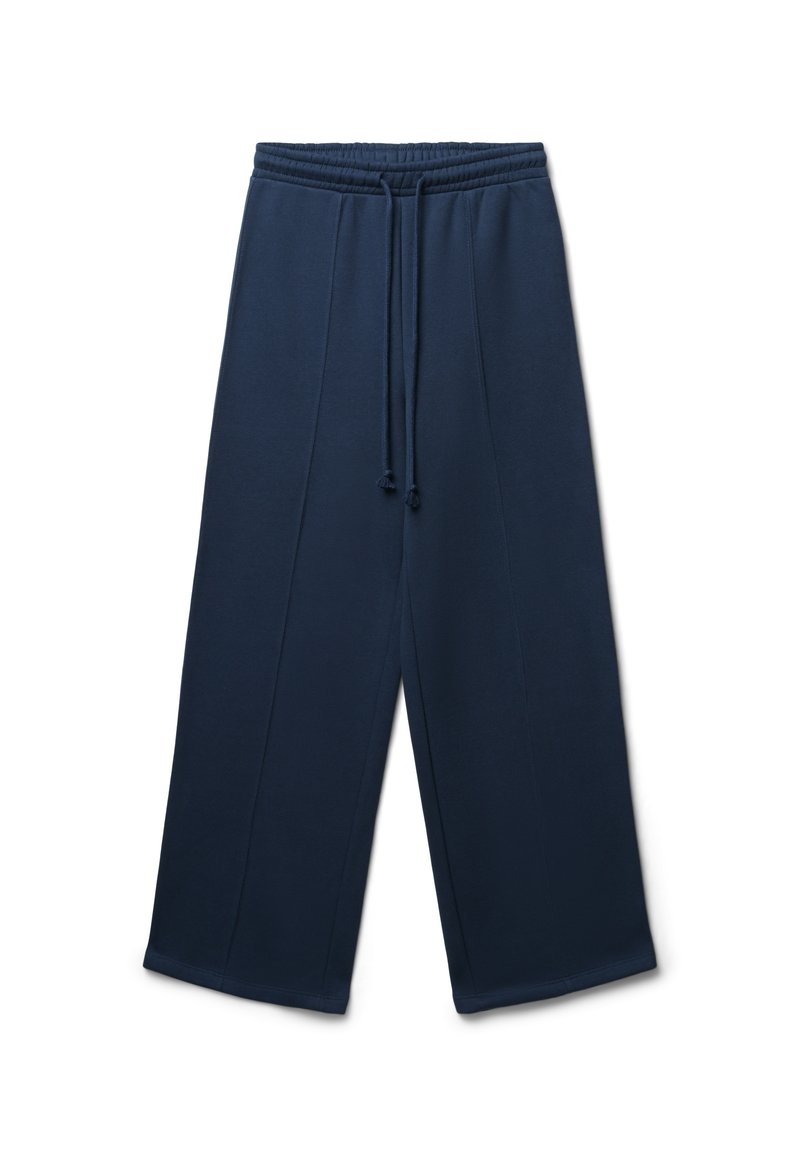 Pantaloni tuta blu navy con vita regolabile, gamba larga e cuciture verticali. Realizzati in tessuto morbido e testurizzato.