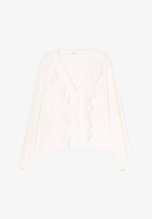 Blouse blanche avec des bords froncés le long de l'encolure et à l'avant. Manches longues avec des poignets froncés, fabriquée dans un tissu léger.