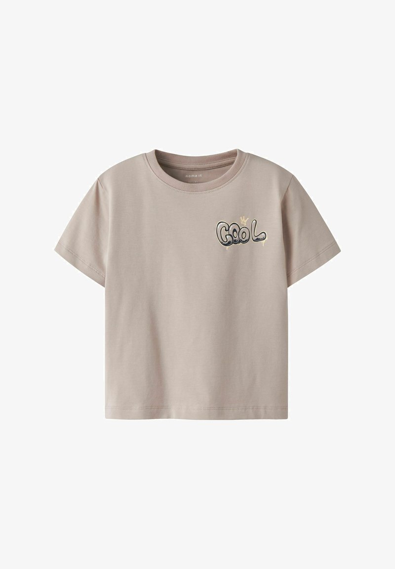 Beige short-sleeve t-shirt with round neck and small graffiti text "COOL" on the left chest printed in black and yellow.