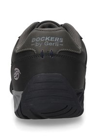 Schwarzer Lederschuh mit einem strukturierten grauen Obermaterial, ausgestattet mit einem Logo nahe der Ferse, runder Form, Gummisohle und Akzentnähten.