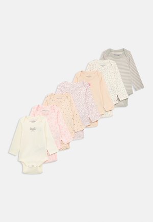 Set of eight infant long-sleeve bodysuits in soft fabric. Colors include cream, pink, and gray, featuring patterns like flowers and polka dots.