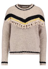 Beżowy sweter dzianinowy z długimi rękawami, w czarno-żółty wzór zygzakowy oraz frędzlami na klatce piersiowej, mankietach i u dołu.