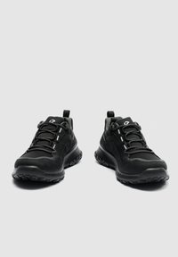 Pair of black athletic sneakers with thick soles and patterned laces, shown from a front angled view on a plain background.