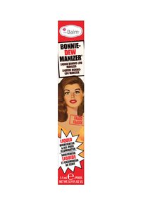 Illuminateur liquide en bouteille, 5,5 mL. L'emballage vertical présente une femme avec des cheveux roux-bruns et des yeux verts vif ; un texte en gras met en avant les détails du produit.