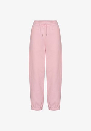 Pantalones de chándal rosa fabricados en una tela suave, con una cintura elástica con cordón y puños acanalados en los tobillos.