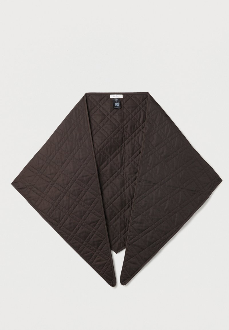 Quilted brown wrap with a triangular shape and a textured surface. Features a double-layered design and a black care label inside.