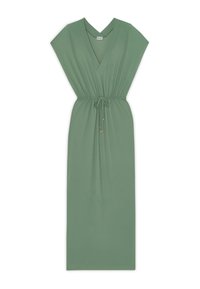 Robe maxi verte avec un décolleté en V, des manches courtes et une taille élastique. Fabriquée dans un tissu lisse, elle présente des accents dorés sur le cordon.