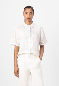 Short-sleeve button-up shirt in light beige with thin vertical stripes. Made of soft fabric, featuring a classic collar and relaxed fit.