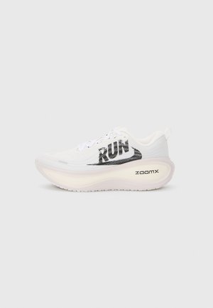 White running shoes with a lightweight mesh upper, large "RUN" text in black, a thick, cushioned sole marked "zoomx," and a sleek design.