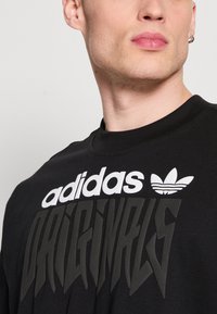 adidas Originals Marškinėliai su spaudiniu - black