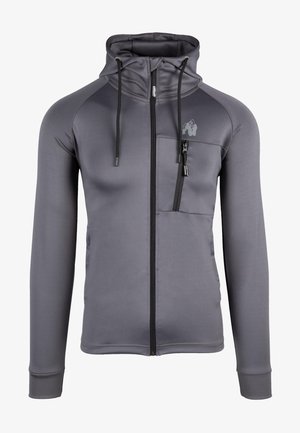 Grijze zip-up hoodie gemaakt van zachte stof, met een hoge kraag, trekkoorden, zijzakken en een borstzak met rits.