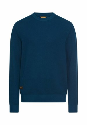 Marineblauer Strickpullover mit Rundhalsausschnitt, strukturierter Stoff, langen Ärmeln und gerippten Bündchen; mit kleinem Markenzeichen am Saum.
